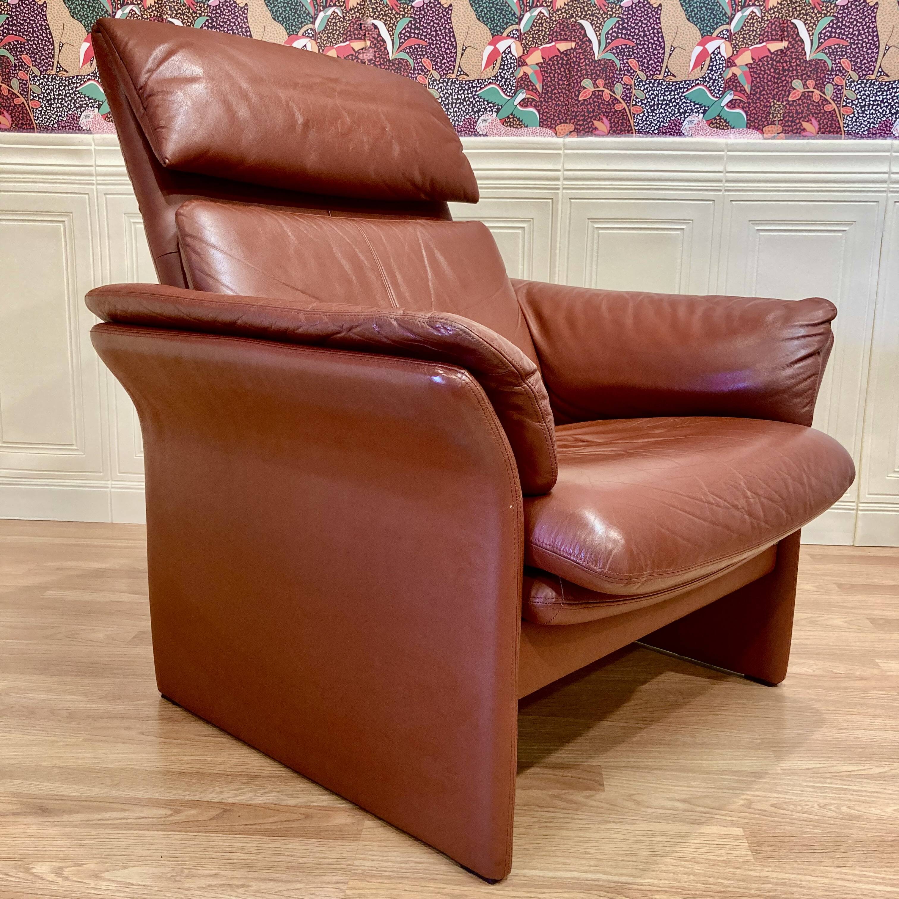 Pair of "Erpo" designer adjustable leather armchairs.