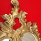 Louis XV style rocaille mirror in wood and gilded stucco