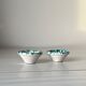 Ceramic salt and pepper shakers, green and white