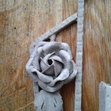 Former Wall coat hangers painted in gray iron