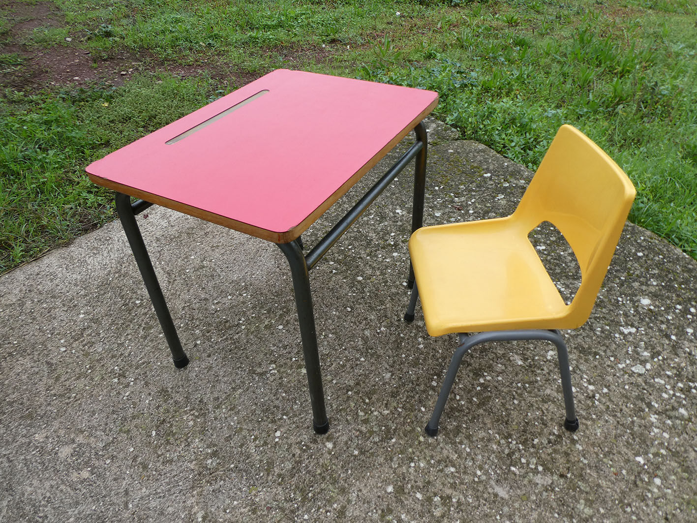 Child desk and vintage schoolboy chair