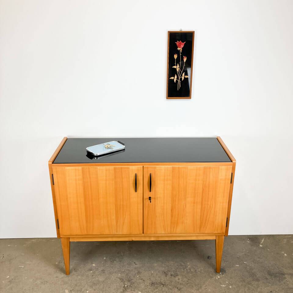 Small sideboard, WK Möbel, light coloured veneer with black glass top, 50s