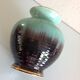 Green and black cermal ball vase 60