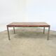 Italian walnut and chrome dining table with 4 drawers