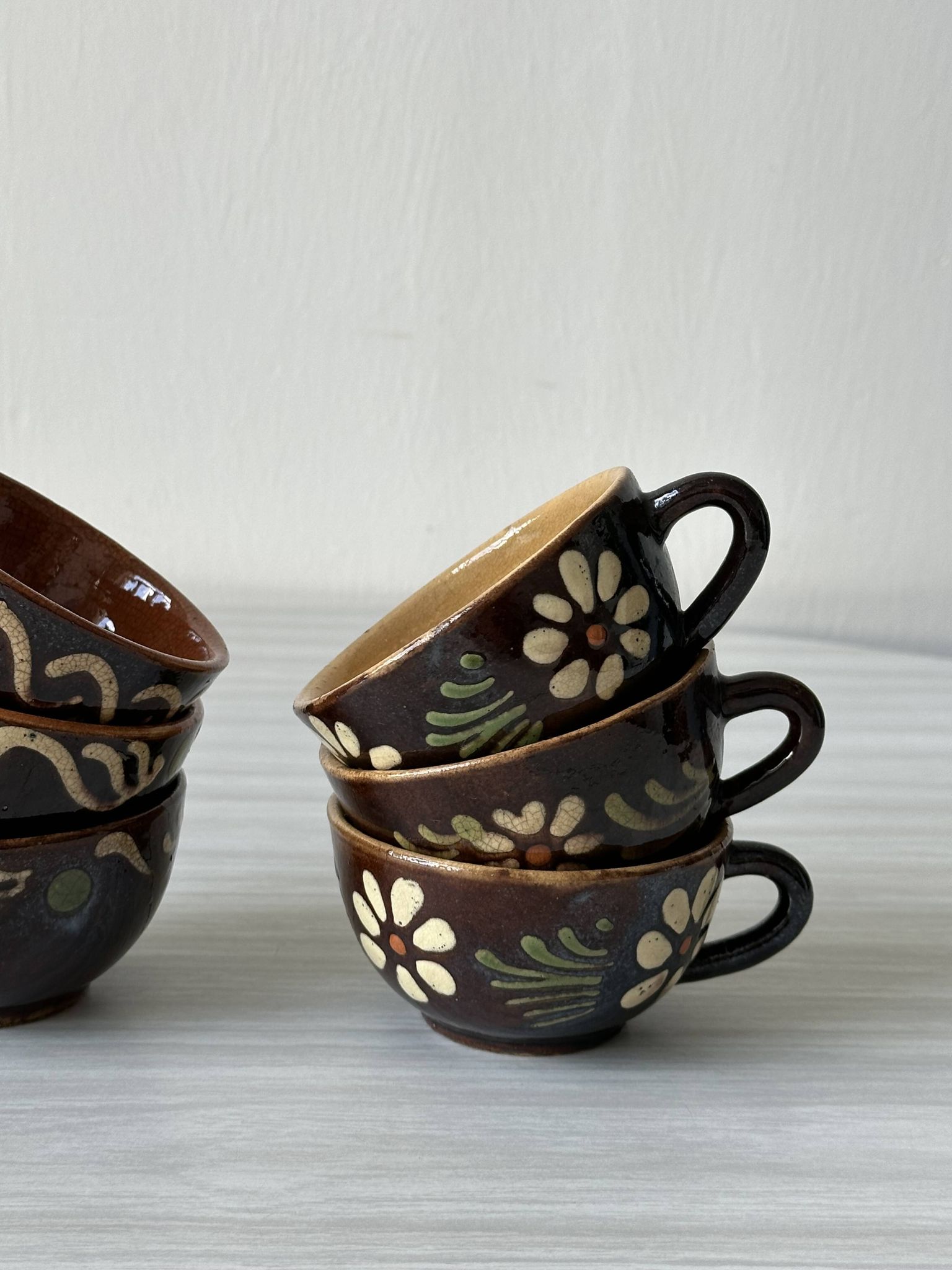 Lot of mismatched Alsatian pottery coffee cups