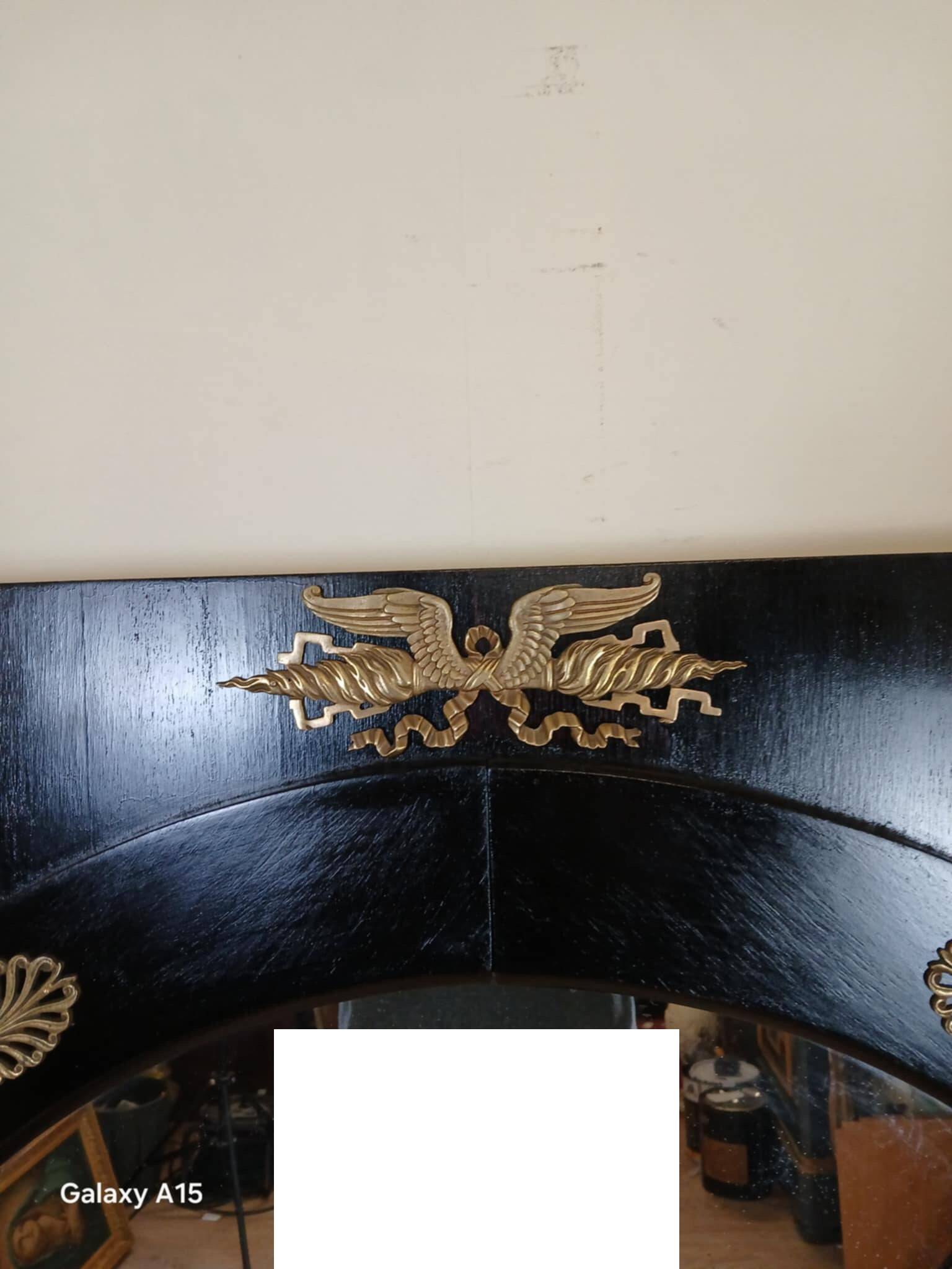 Miroir Empire en bois laqué noir et bronze doré époque XIXeme