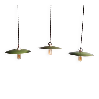 Trio of large industrial suspensions in green enamelled sheet metal.