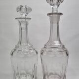 Set of two carved crystal decanters, 24 cm