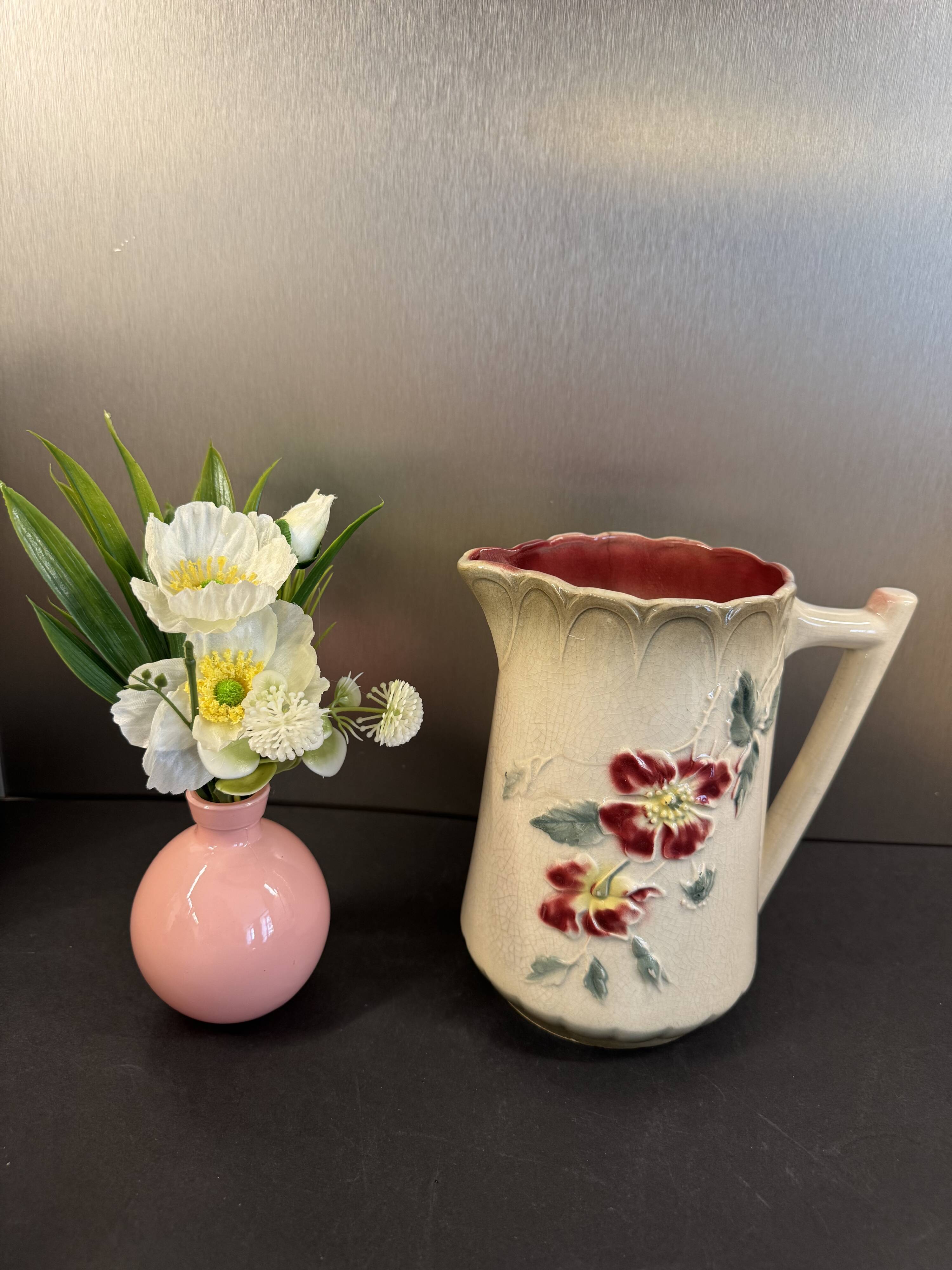 Antique pitcher in slipware with floral decoration – red and cream floral design