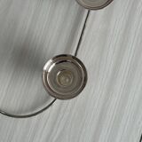 Shiny stainless steel candlestick holder