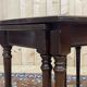English nesting tables in mahogany and leather top under glass - work from the 1950s