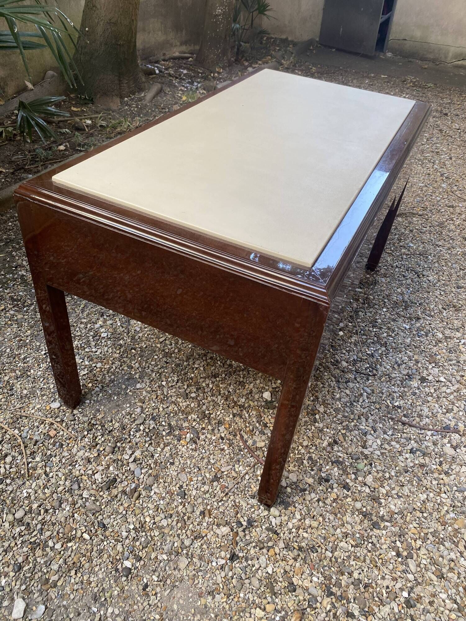 Art Deco desk in varnished mahogany.