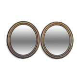 Pair of oval mirrors from the Louis Philippe period in gilded wood.