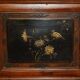 Antique Chinese armoire hand-carved around 1880 with country-style handles.