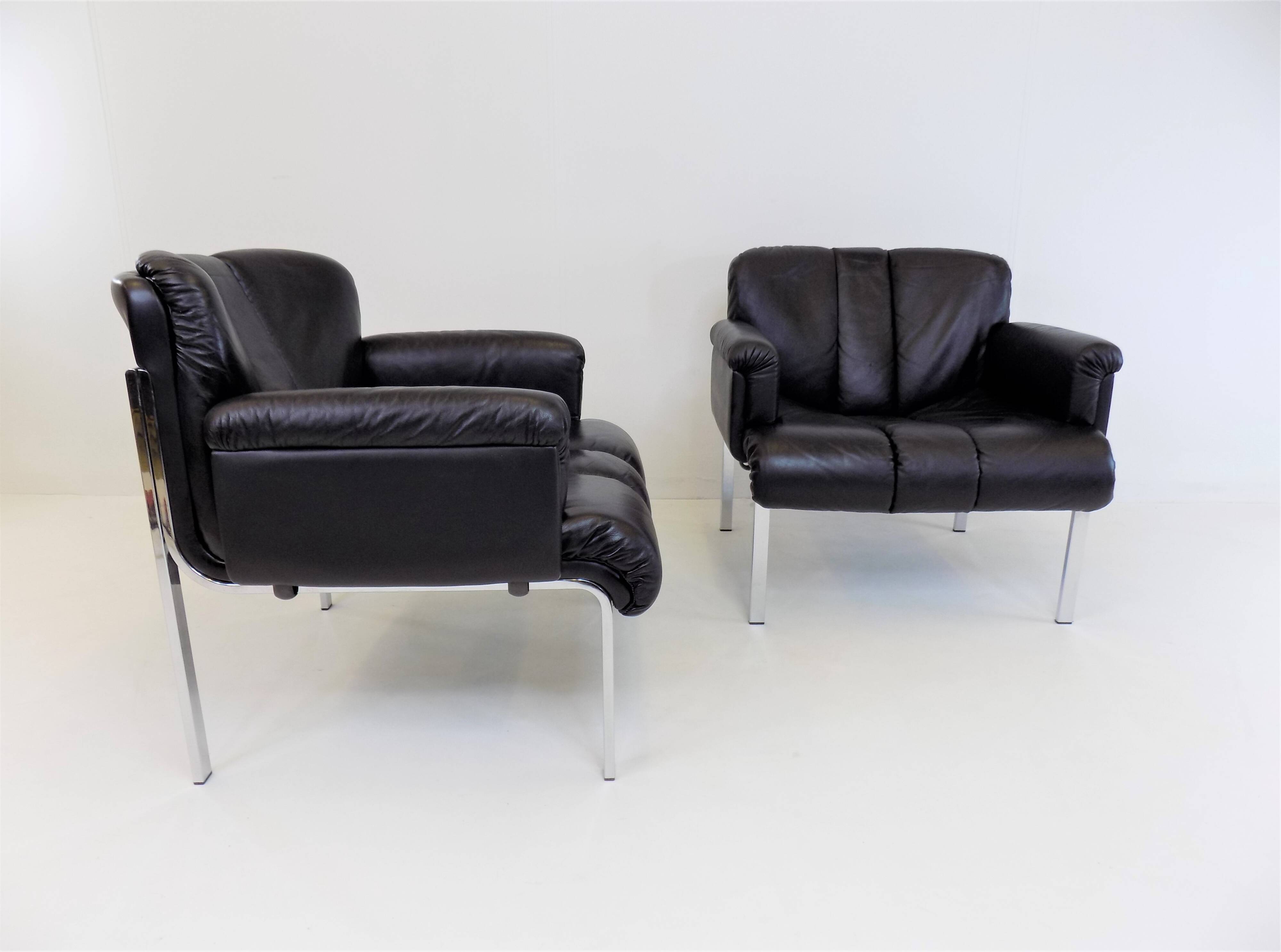 Set of 2 Girsberger Eurochair leather armchairs