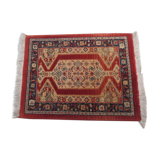 Old rectangular wool carpet, oriental decoration