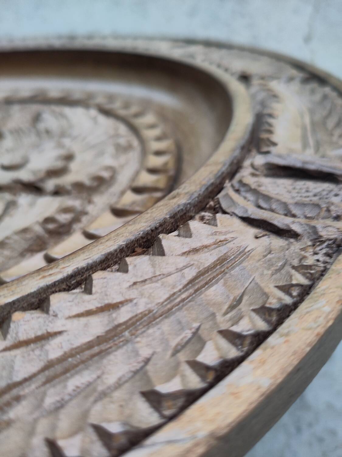 Round carved wooden dish