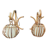 Pair of Louis Sognot rattan wall lights.