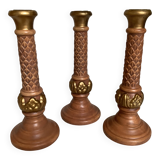 Trio of large brown and gold candlesticks
