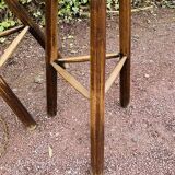 Set of three brutalist tripod stools