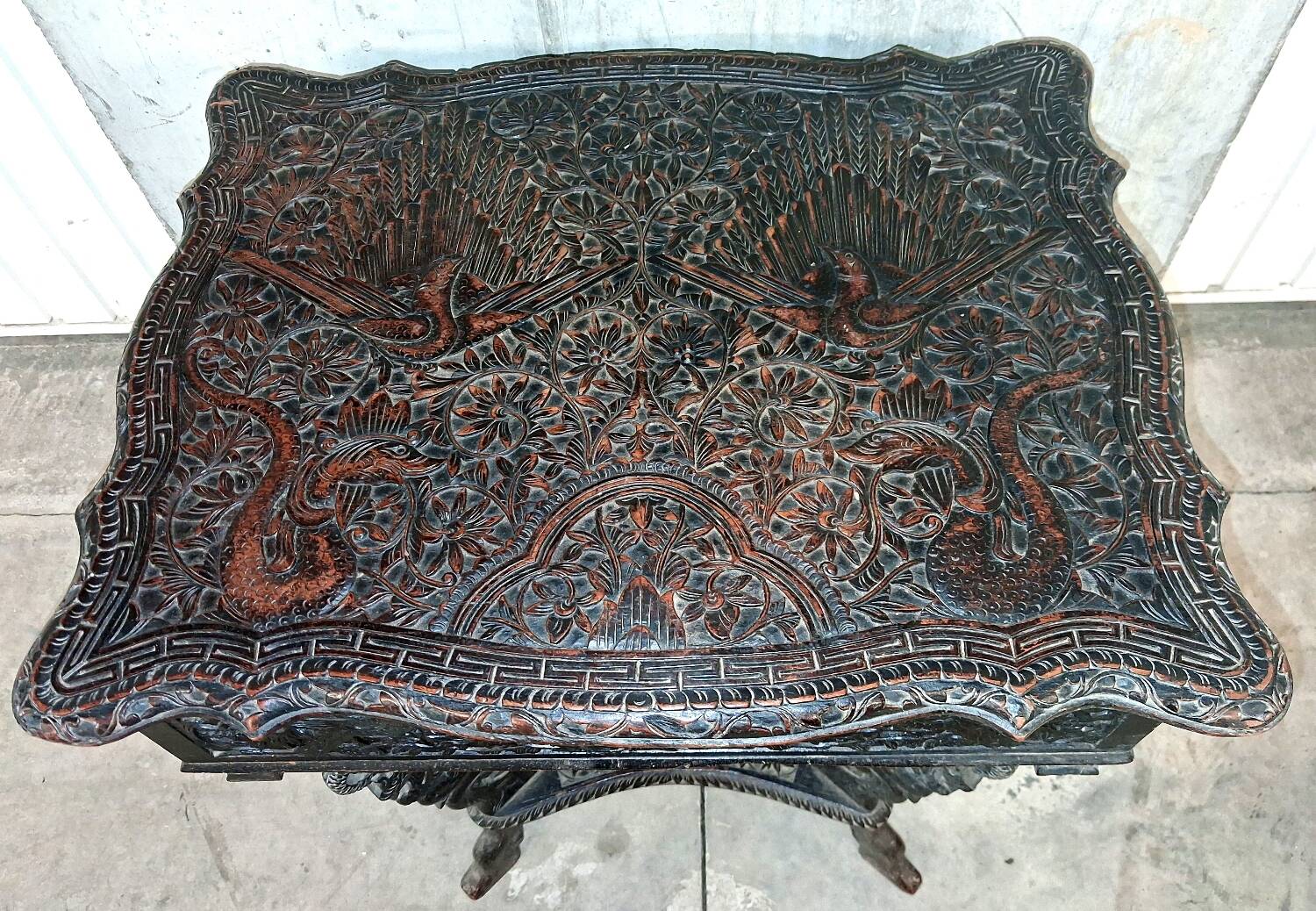 Ethnic carved wooden worker's furniture