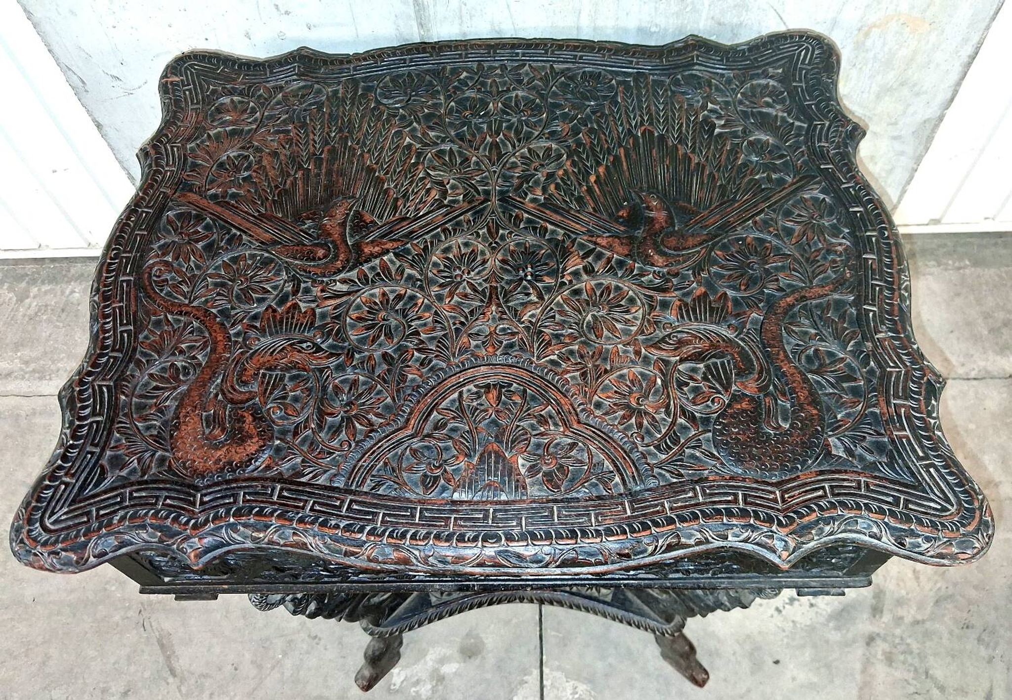 Ethnic carved wooden worker's furniture
