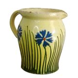 Pichet ancien en faïence française orné de fleurs peintes à la main