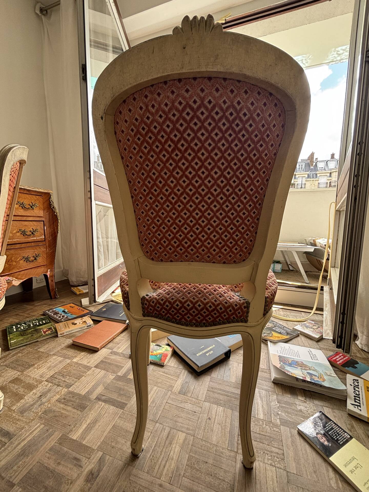Louis XV style chair in patinated wood, fully upholstered in a fabric.