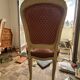 Louis XV style chair in patinated wood, fully upholstered in a fabric.