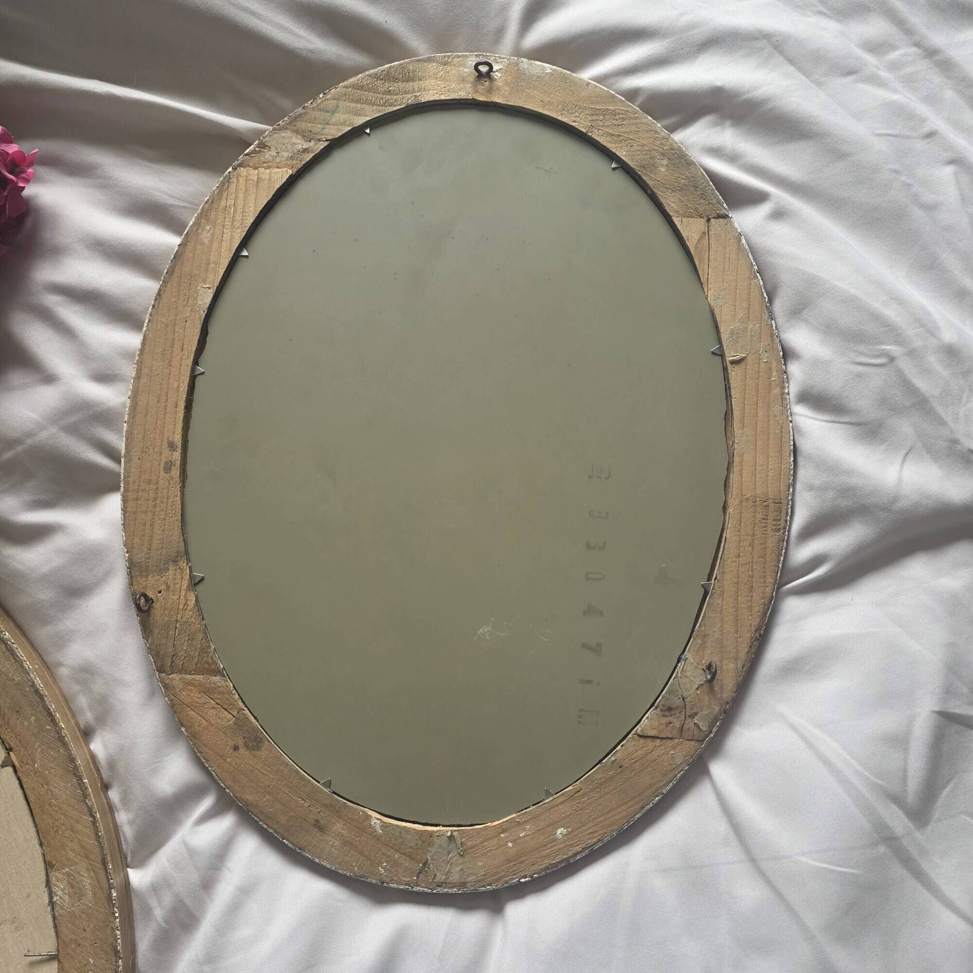 paire de miroirs ovales anciens