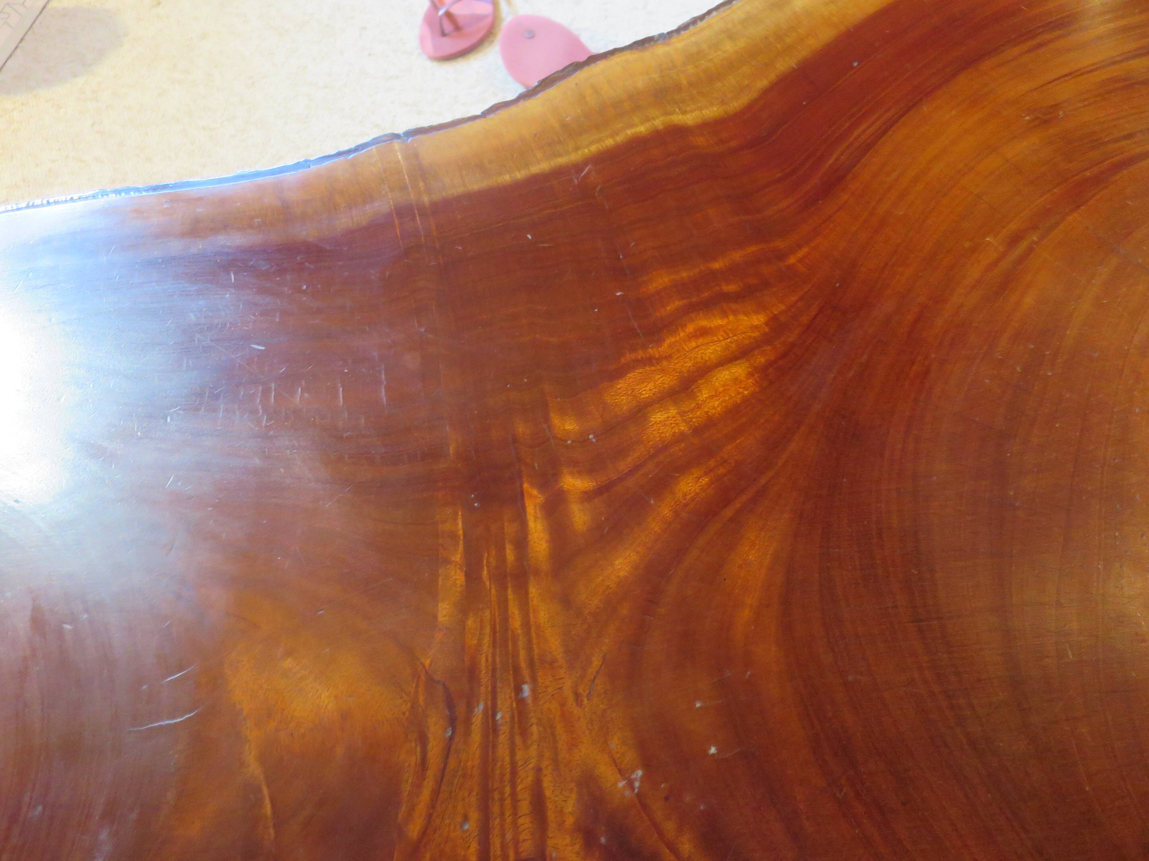 Tripod coffee table - solid okoumé wood - organic shape - brutalist style