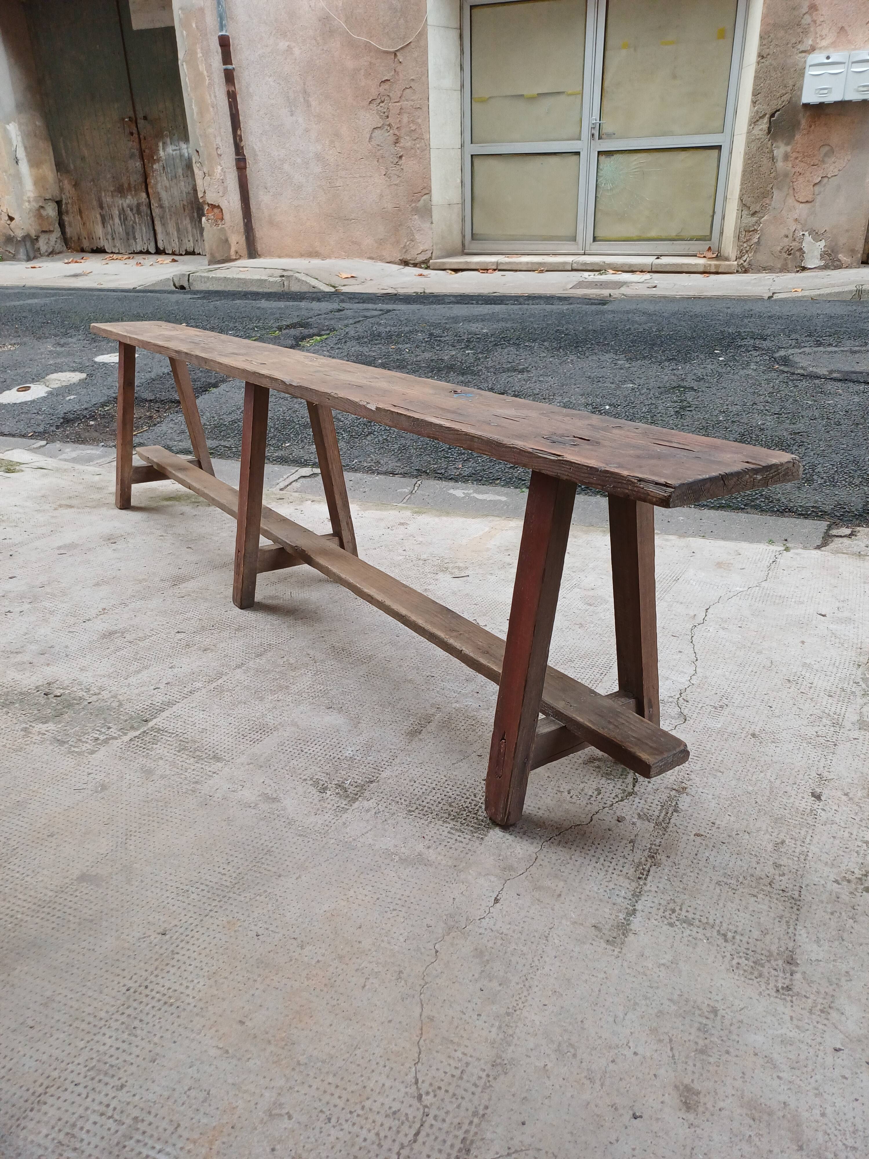 Antique wooden bench from a Catholic school, circa 1900. Beautifully crafted.