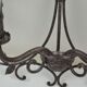 pair of grey patinated iron wall sconces