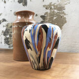 Vase dripping in varnished earth
