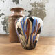 Vase dripping in varnished earth