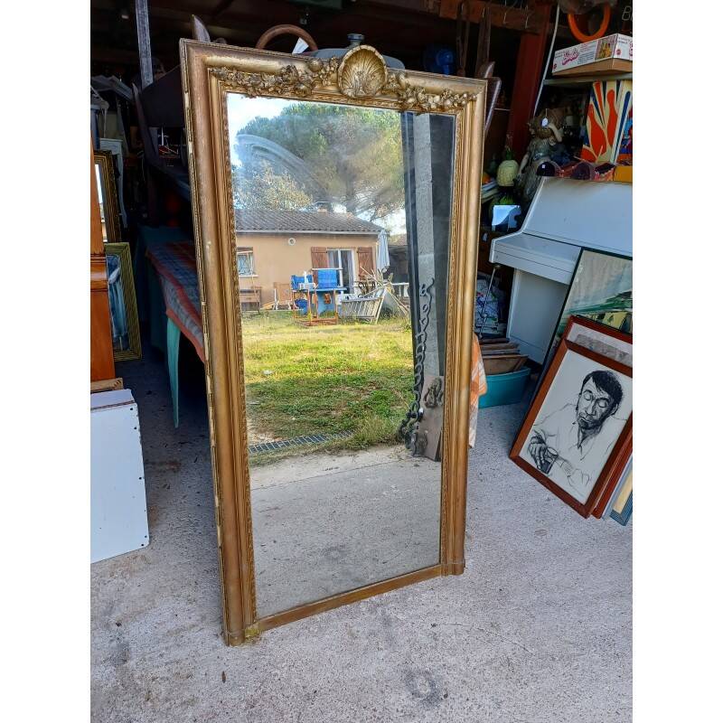 19th century mirror in wood and gilded stucco "scallop shell"