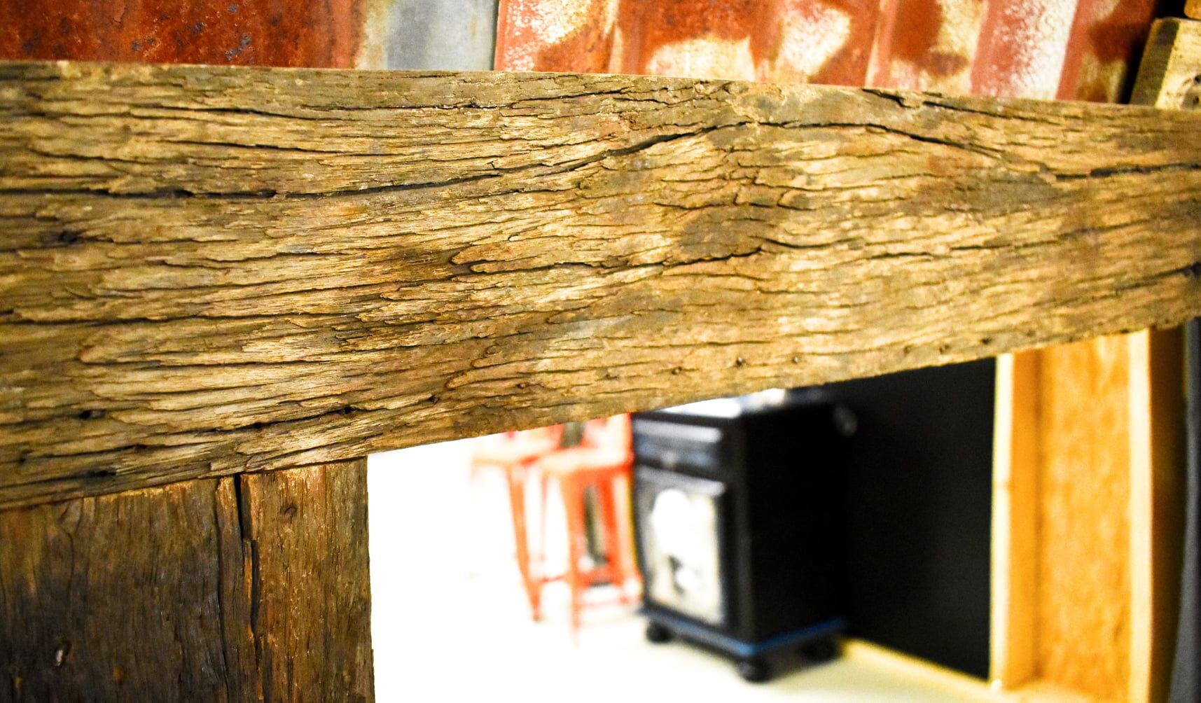 Industrial mirror made from recycled solid exotic wood