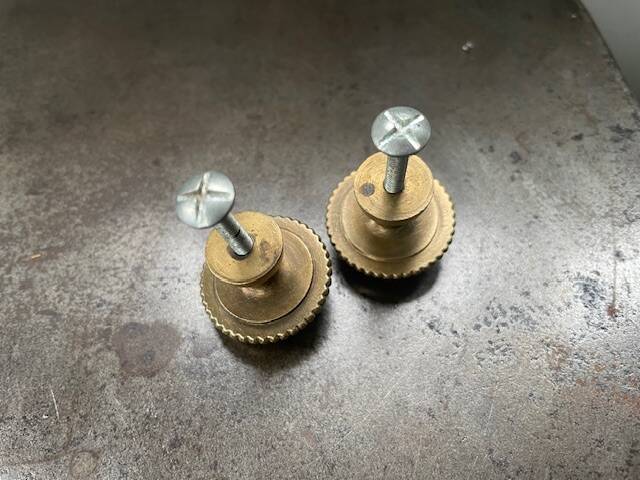 Old brass handle knobs and rosettes