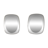 Pair of oval smoked glass mirrors, 1970s.