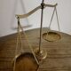 Gold metal trebuchet scale