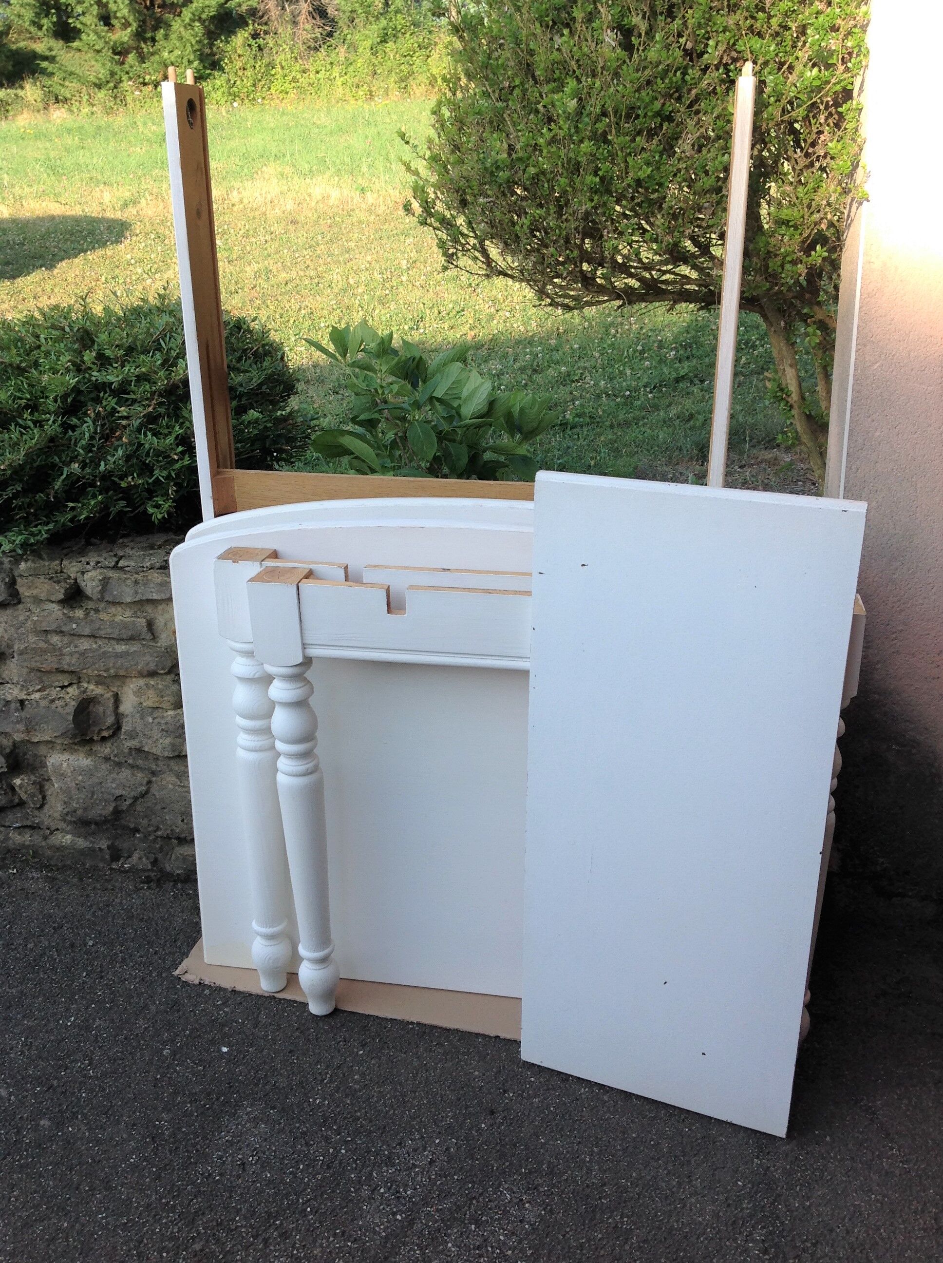 White farmhouse table set and four chairs