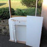 White farmhouse table set and four chairs