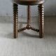 Tripod stool, with carved legs, around 1940