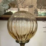 Bronze lamp and amber globe circa 1900
