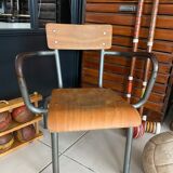 Old Mullca school chair with armrests