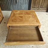 Square coffee table with a drawer in cherry wood.
