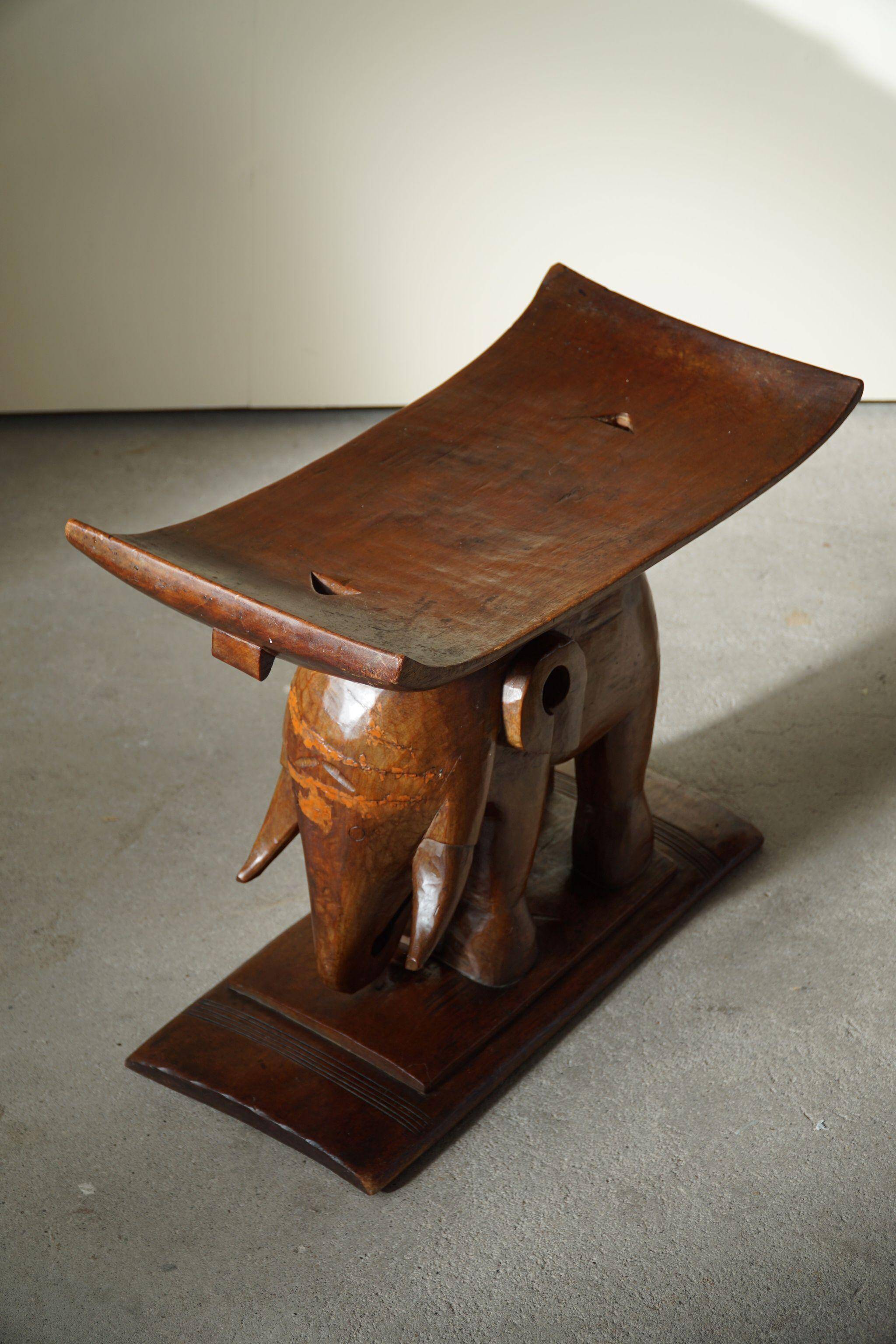 African elephant stool in carved wood, mid-century in Wabi Sabi style, 1940s.