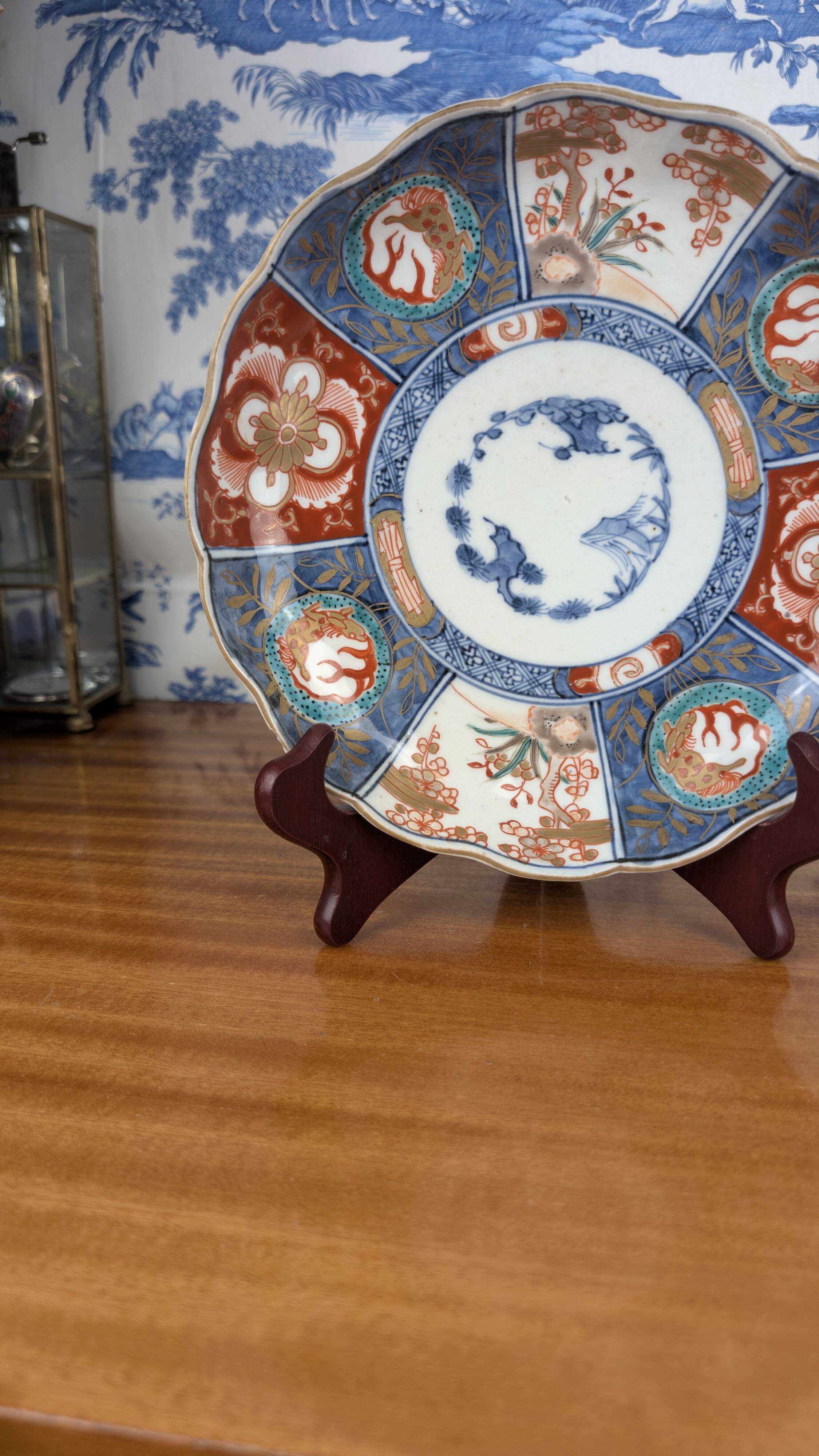 Signed Imari porcelain plate with Japanese lake and deer decoration, 19th century