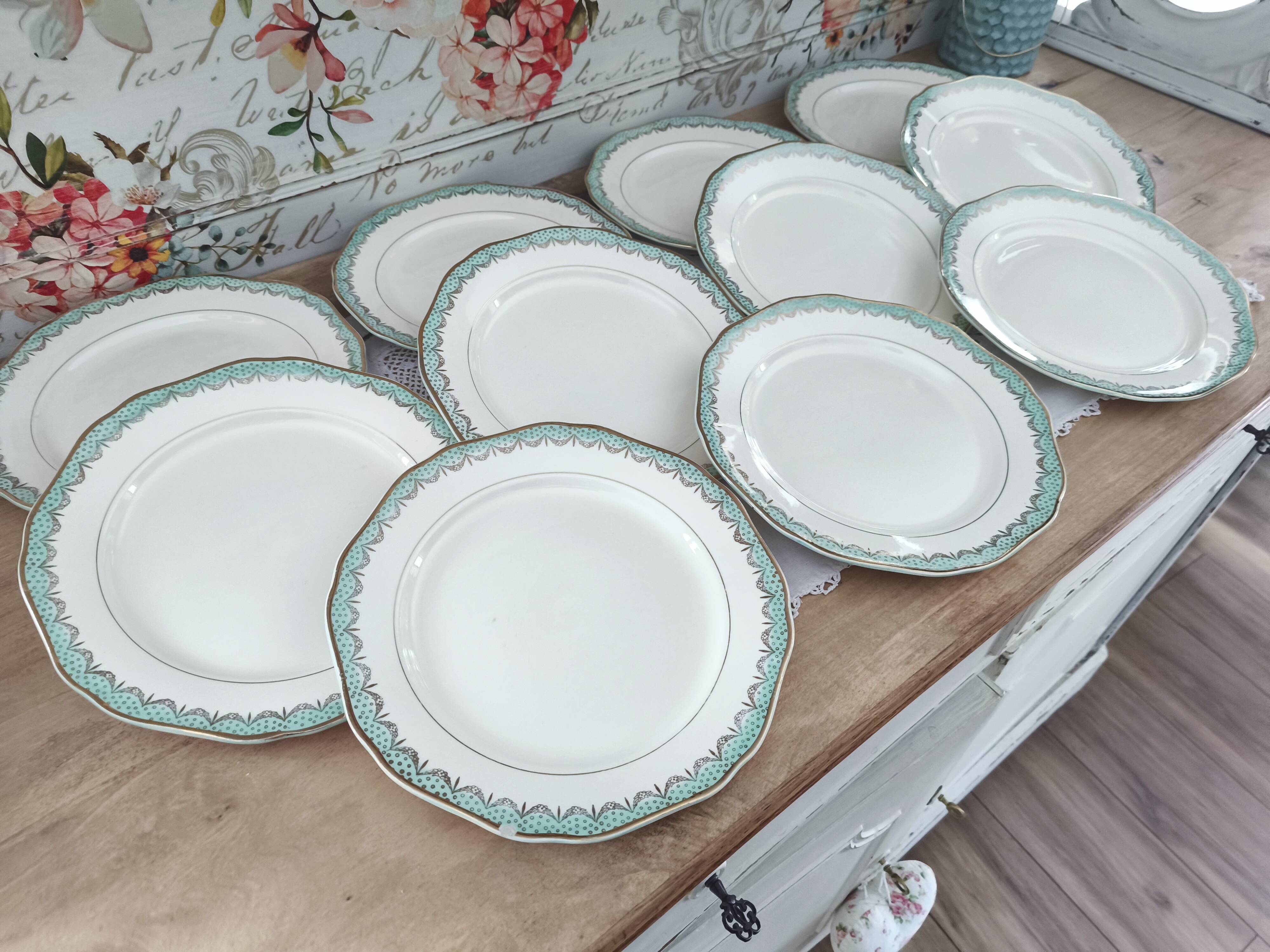 Set of 11 Longwy France earthenware dinner plates, Trianon model