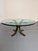 Thick glass coffee table with metal legs, Italian design from the 70s, vintage.